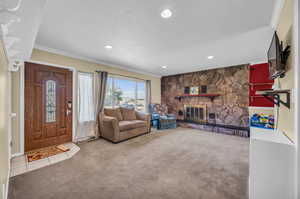 Interior space featuring a fireplace and ornamental molding