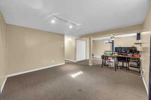 Family room featuring carpet and adjustable track lighting