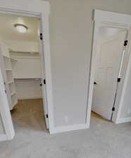 Interior space with light colored carpet