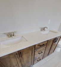 Bathroom with vanity and toilet