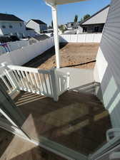 Back stairs to covered patio