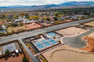 Birds eye view of property with a mountain view