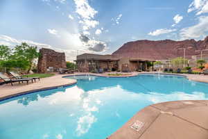 View of pool featuring a patio area and a mountain view