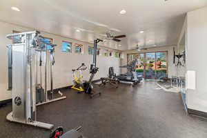 Gym featuring ceiling fan