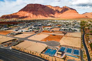 Birds eye view of property with a mountain view