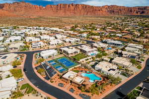 Birds eye view of property with a mountain view