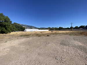 View of street featuring a rural view and a mountain view