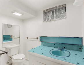 3/4 bath with Walk in shower, original sink and countertop.