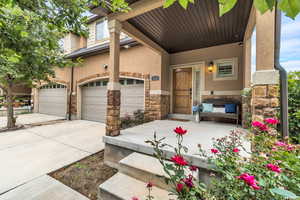 Front Entrance: Inviting entrance end unit with two car garage that has direct access to home. Garage has outlet for charging for electric car.