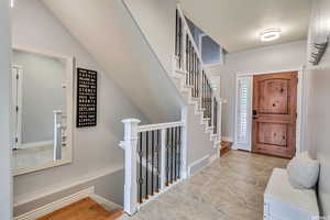 Foyer entrance with travertine flooring.