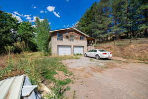 View of property with a garage