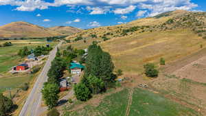 Aerial view with a rural view and a mountain view