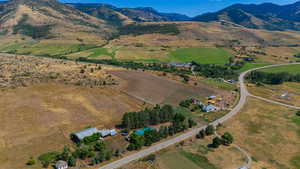 Drone / aerial view with a rural view and a mountain view