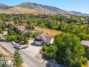 Drone / aerial view featuring a mountain view