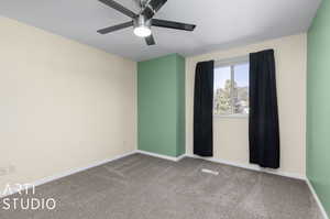 Unfurnished room with carpet floors and ceiling fan