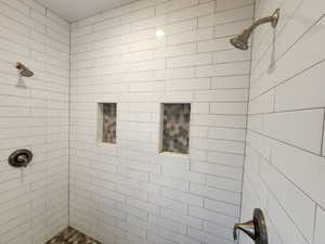 Bathroom with tiled shower