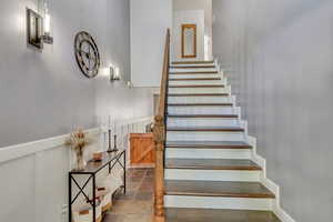 Stairway featuring tile patterned flooring