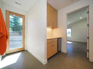 Kitchen featuring lofted ceiling