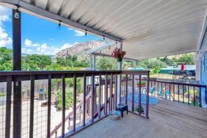 Exterior space with a mountain view. Deck has been scrapped and painted since this photo.