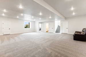 Basement with light carpet