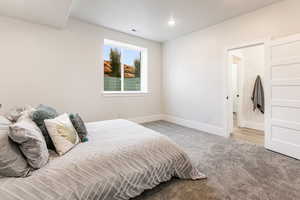 Bedroom 3 with light hardwood / wood-style floors