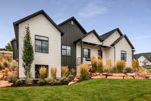 View of front of home with a front lawn