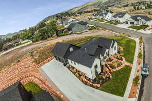 Drone / aerial view featuring a mountain view