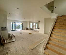 View of the great room and stairs to second floor.