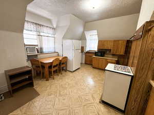 Eat in kitchen with corner dryer hookup.