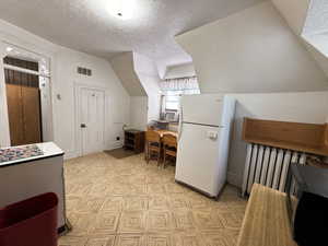 Walk-in pantry on south wall.