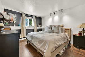 Bedroom with a walk-in closet.