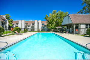 View of pool with a gazebo