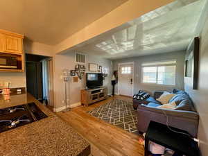 Living room featuring light hardwood / wood-style floors