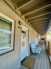 Entrance to property featuring a porch