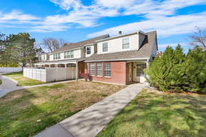 Front of property with a front lawn