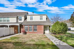 View of front of property featuring a front lawn