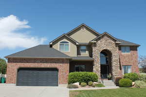 View of front of house with a garage