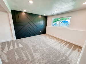 View of carpeted spare room