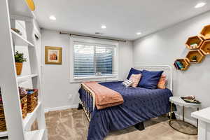 View of carpeted bedroom