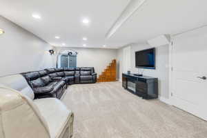 Living room with light colored carpet