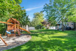 View of yard with a playground