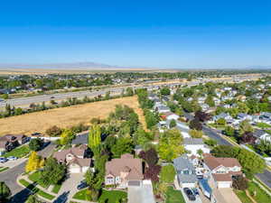 Birds eye view of property with a mountain view