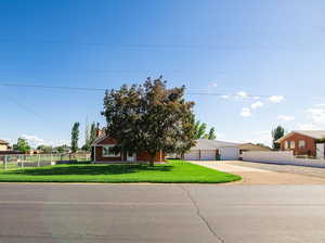 View of front of home with a front yard