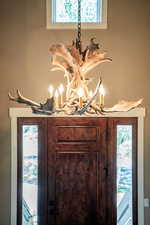 Room details featuring a notable chandelier