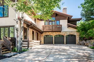 View of front of home with a balcony