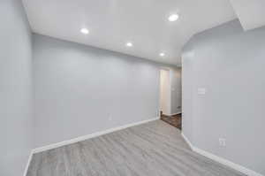 Spare room with light wood-type flooring