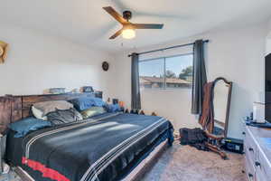 Bedroom featuring carpet floors and ceiling fan