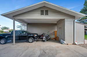 Exterior space featuring a carport