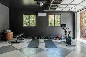 Workout area with a wall mounted air conditioner