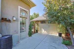 Side entry & rain barrel with hose attachment